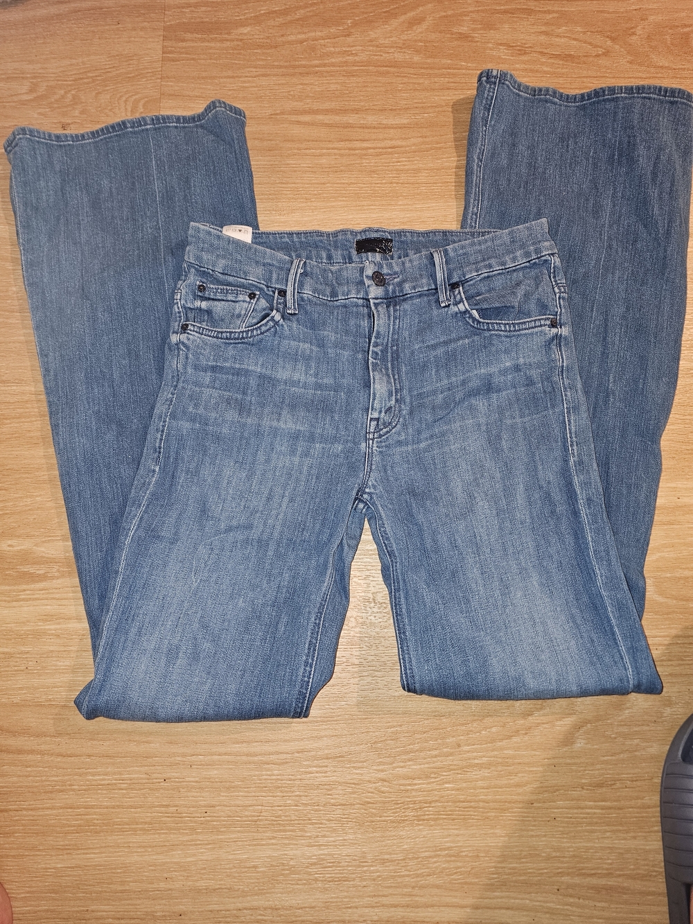 MOTHER Light Wash Bootcut Jeans in Denim Blue